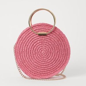 Round bag braided paper straw HM pink with gold handles and chain